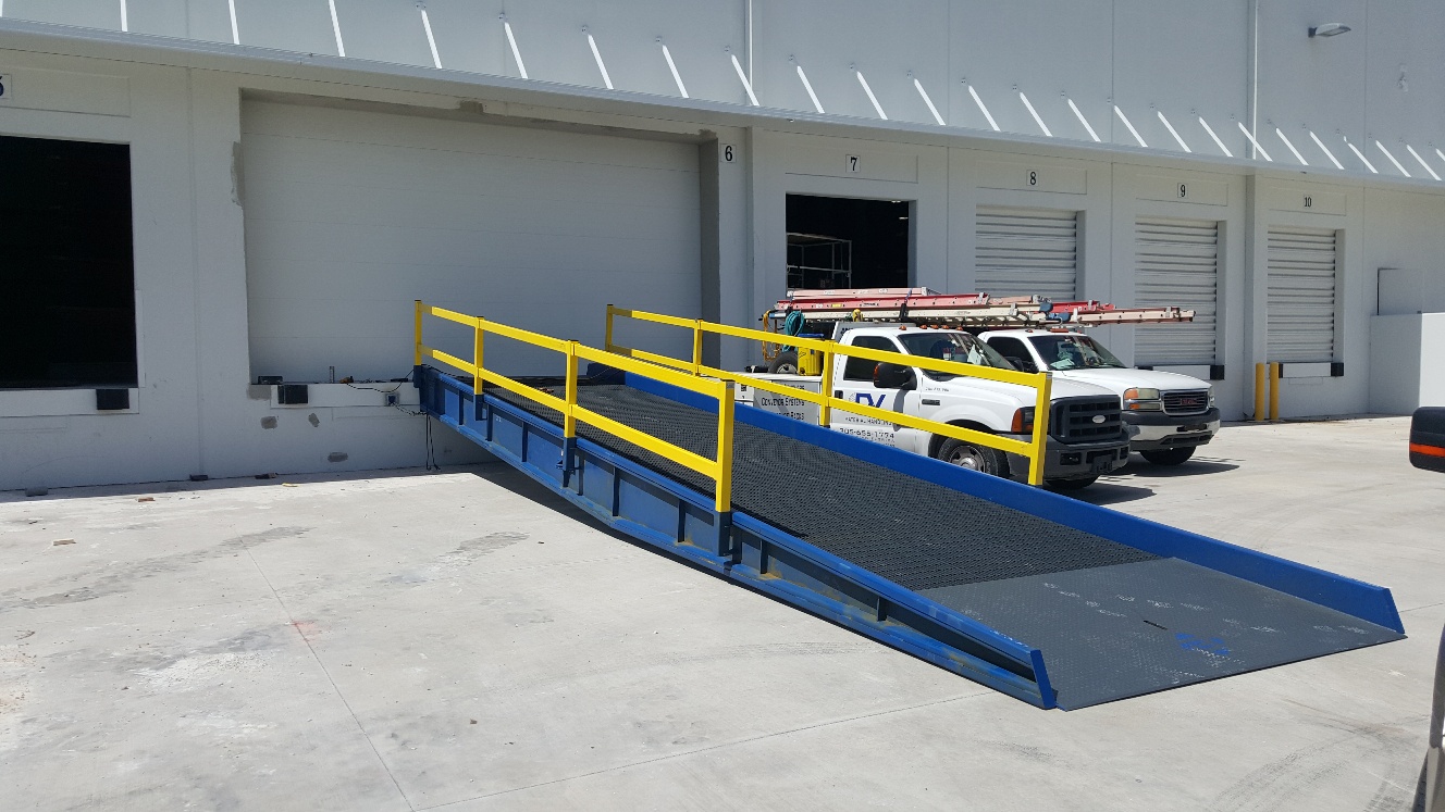 Portable Yard Ramps, ground-to-truck loading applications for over the road trailers. Manufactured in 7 working days, save on freight cost with three ramps. 